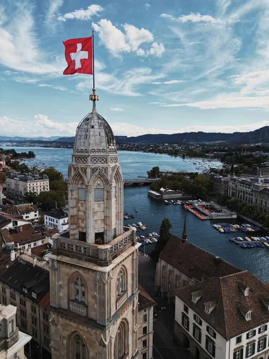 Zurich skyline with the Swiss flag